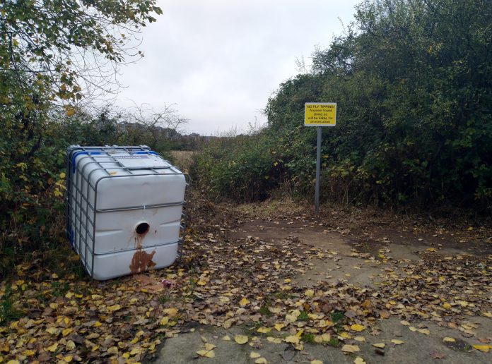 Fly-tipped container Fly-tipped container