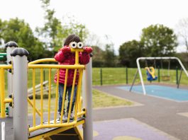 a small child at a play area