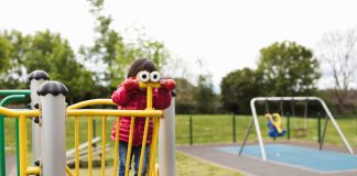 a small child at a play area