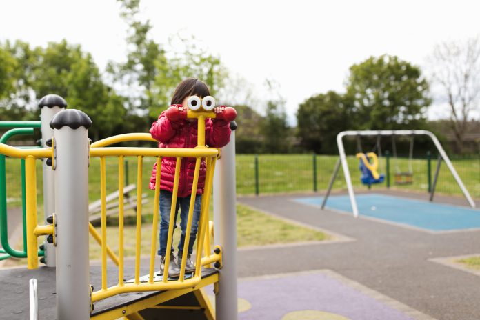 a small child at a play area